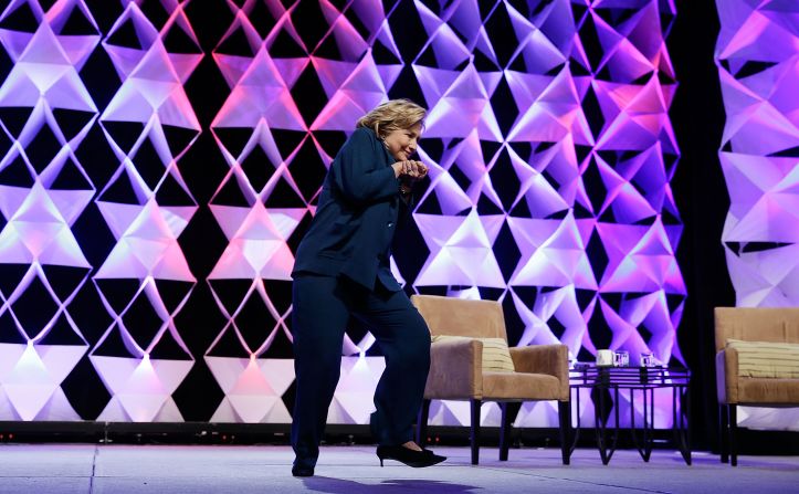 Hillary Clinton ducks after <a href="http://politicalticker.blogs.cnn.com/2014/04/10/woman-reportedly-throws-shoe-at-hillary-clinton-in-las-vegas/">a woman hurls a shoe at her</a> during a speech in Las Vegas on Thursday, April 10. The Secret Service took the woman into custody.