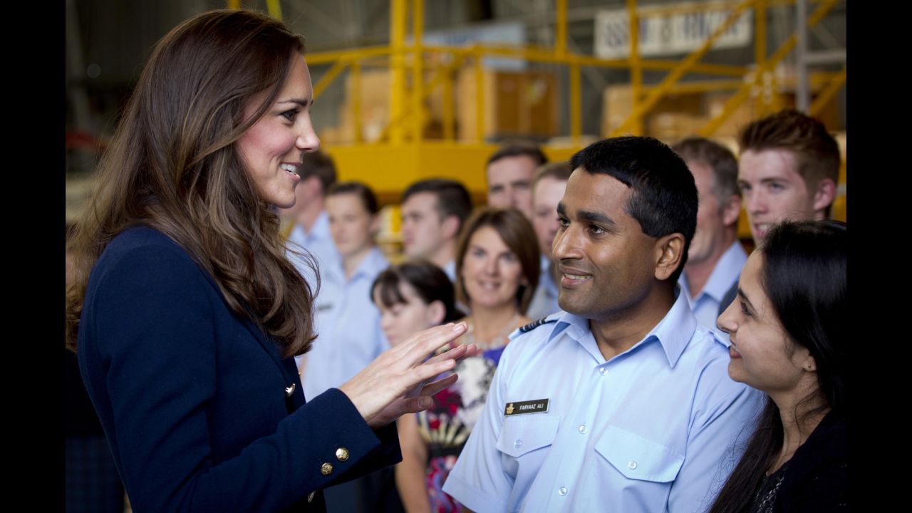 Catherine greets military families at the Royal New Zealand Air Force base in Auckland on April 11.
