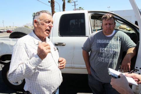 Cliven Bundy, left, and his son Dave talk to a reporter in Las Vegas on Monday, April 7. Bundy's dispute with the government began two decades ago, when the Bureau of Land Management changed grazing rules for the 600,000-acre Gold Butte area to protect an endangered desert tortoise, KLAS reported. Bundy refused to abide by the changes and stopped paying his grazing fees to the federal bureau, which he contends is infringing on state rights.