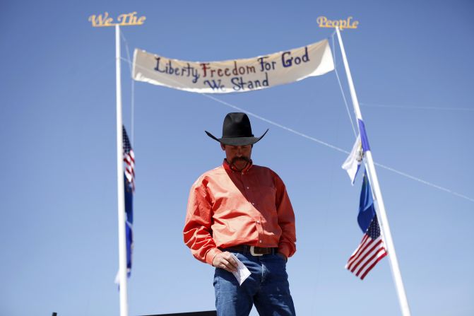 Rancher Derrel Spencer speaks during a rally in support of Bundy on April 7.