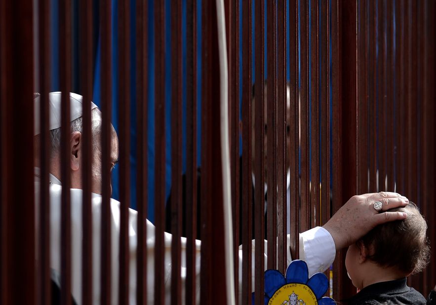 The Pope meets the faithful as he visits the Roman Parish of San Gregorio Magno in April 2014.