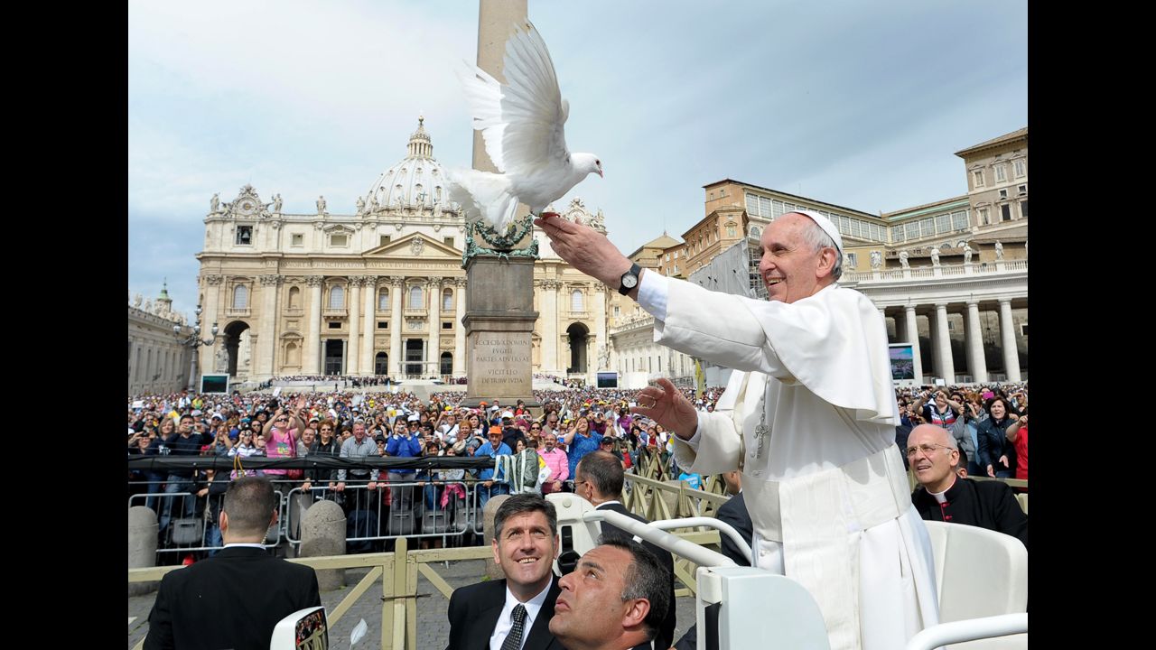 Francis frees a dove in May 2013 during his weekly general audience in St. Peter's Square.