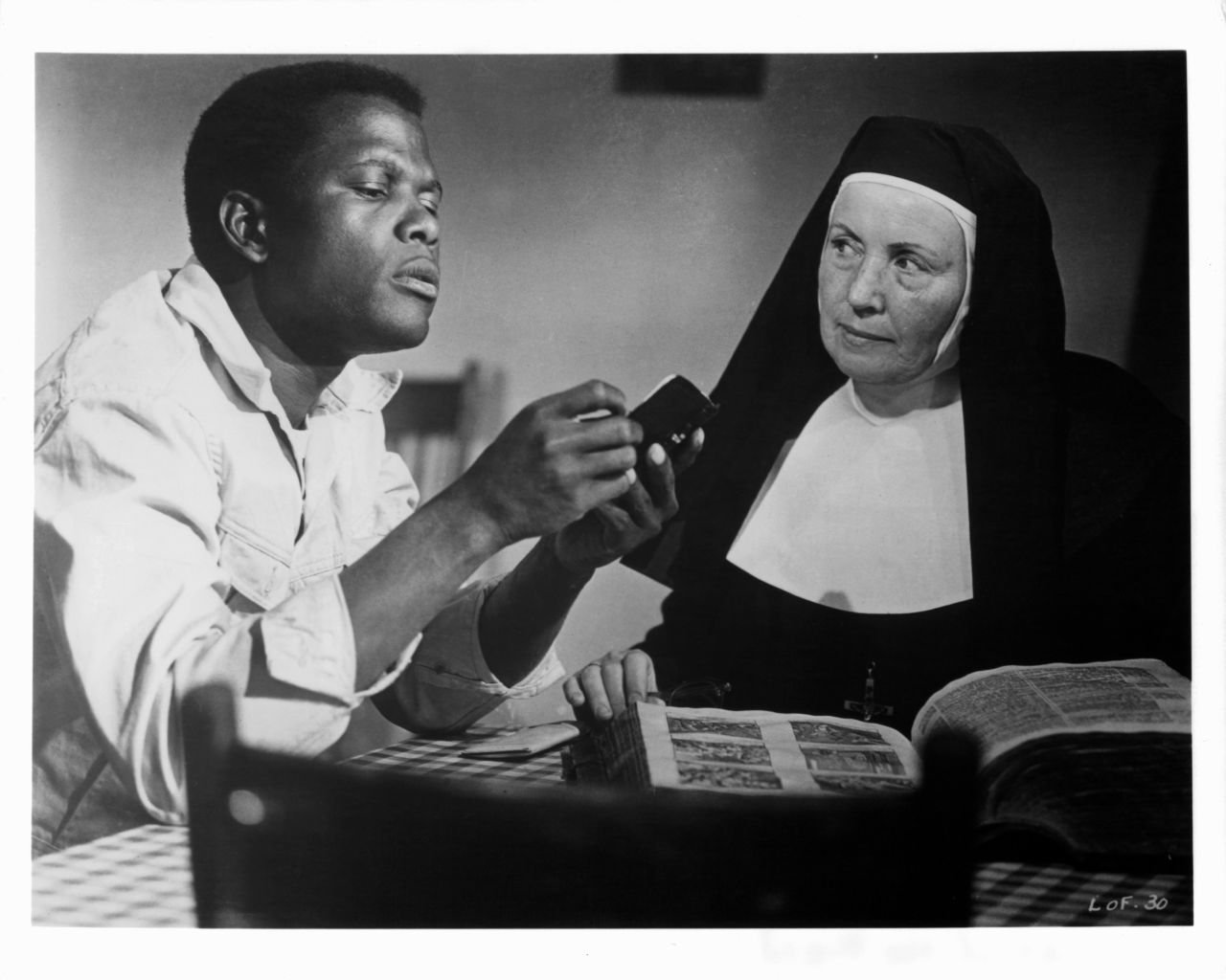 In the 1963 film "Lilies of the Field," Poitier -- seen here with Lilia Skala -- plays a workman who helps a group of East German nuns construct a chapel in the Arizona desert. Poitier's performance earned him an Oscar, a first for a black actor. Since then, three other black performers have won best actor: Denzel Washington, Jamie Foxx and Forest Whitaker.