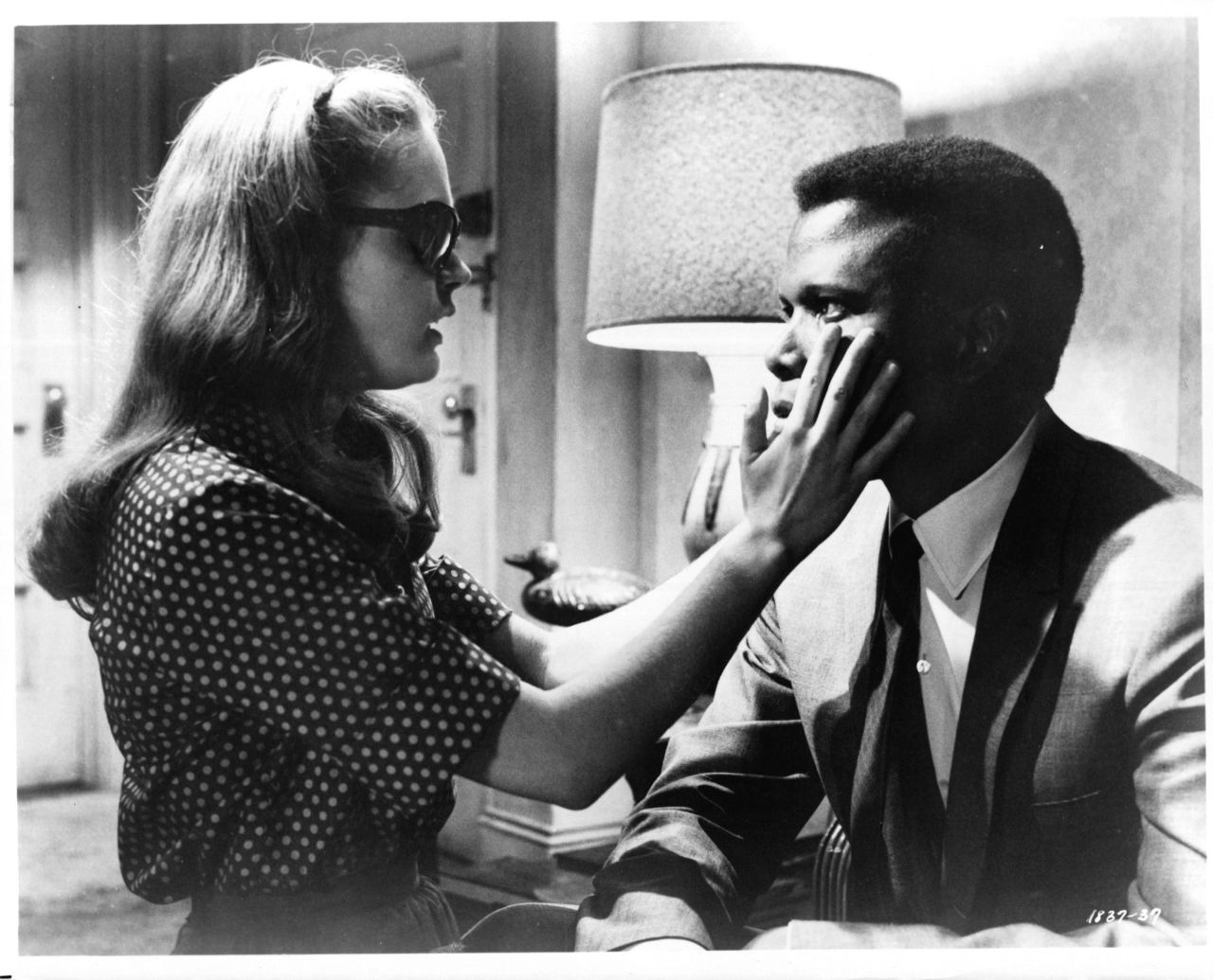 In 1965's "A Patch of Blue," Elizabeth Hartman plays a blind woman who develops a romance with Poitier's character, an office worker. The interracial romance was tough stuff for the time, and a scene of Hartman and Poitier kissing was cut from the film's showings in the South. 