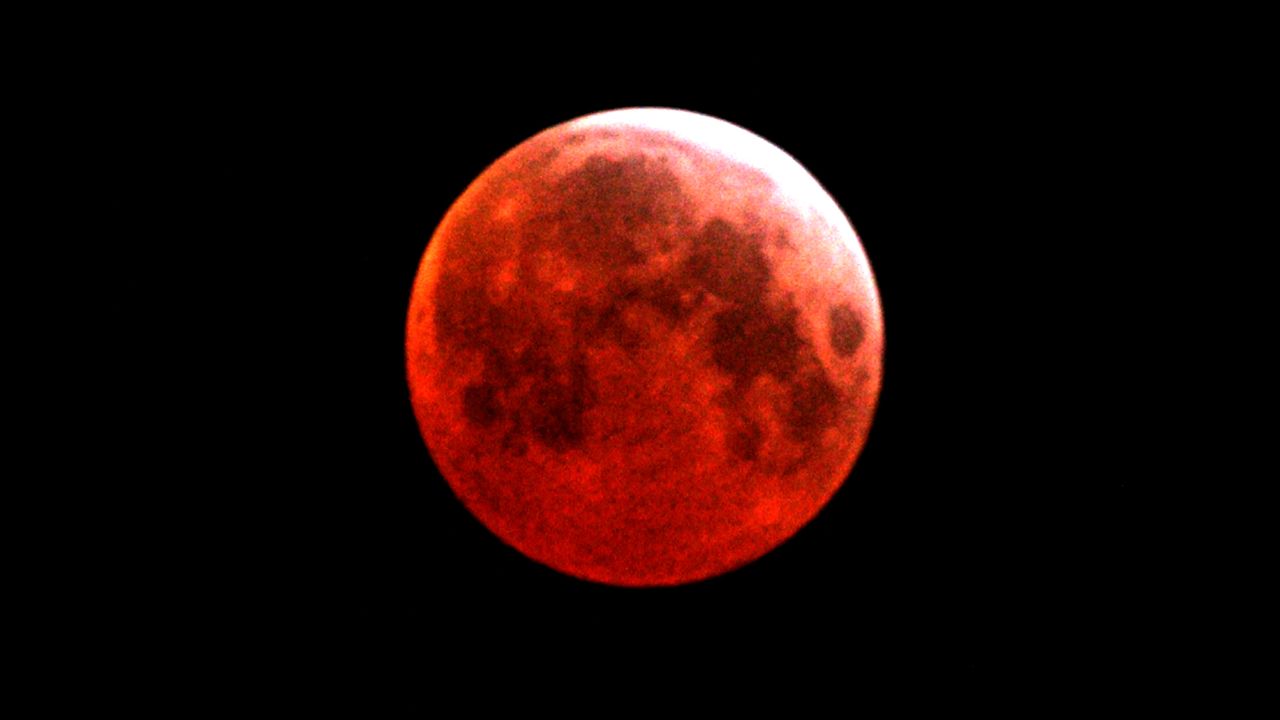 A blood moon is seen over Gaza City in March 2007.