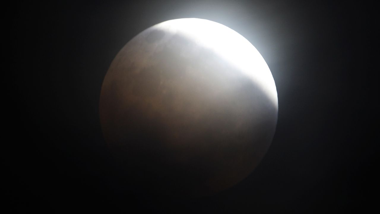 The moon is seen from Manila, Philippines, during the total lunar eclipse in December 2011.