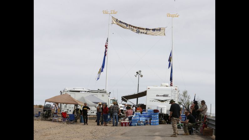 People gather at a protest area along State Route 170, near the cattle roundup on April 11.