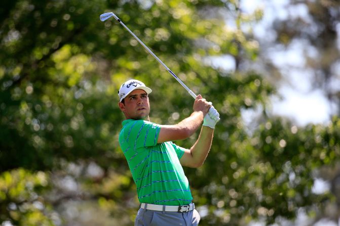 American Gary Woodland matched a course record by hitting a 30 on the front nine. He tailed off, though, on the back nine.