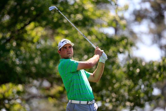 American Gary Woodland matched a course record by hitting a 30 on the front nine. He tailed off, though, on the back nine. 