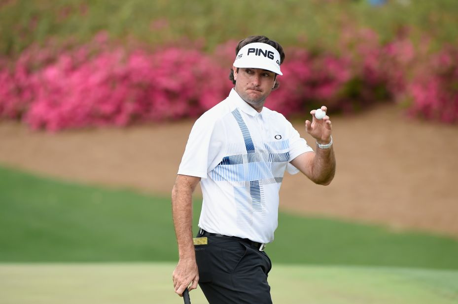 Watson strikes a typical pose during his final round at Augusta as he closed on his second Masters win in three years.
