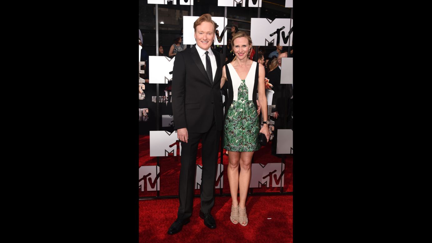 Host Conan O'Brien arrives with Liza Powel at the 2014 MTV Movie Awards on Sunday, April 13, in Los Angeles. Check out the other celebrities as they grace the red carpet. 