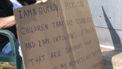 mxp ohio man holds bully sign_00001006.jpg