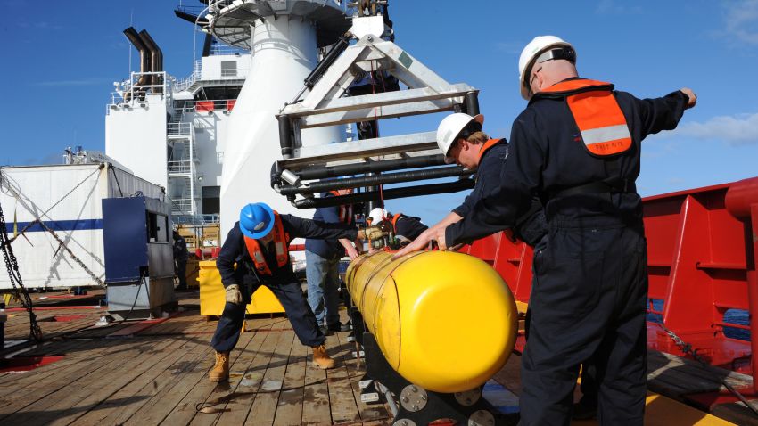 AT SEA - APRIL 1: In this handout image provided by the U.S. Navy, The Bluefin 21, Artemis autonomous underwater vehicle (AUV) is hoisted back on board the Australian Defence Vessel Ocean Shield after successful buoyancy testing April 1, 2014 in the Indian Ocean. Joint Task Force 658 is currently supporting Operation Southern Indian Ocean, searching for the missing Malaysia Airlines flight MH370. The airliner disappeared on March 8 with 239 passengers and crew on board and is suspected to have crashed into the southern Indian Ocean. (Photo by Mass Communication Specialist 1st Class Peter D. Blair/U.S. Navy via Getty Images)