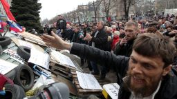 Pro-Russian supporters attend a rally in front of the security service building occupied by Pro-Russian activists in Lugansk, Ukraine, on Monday, April 14.