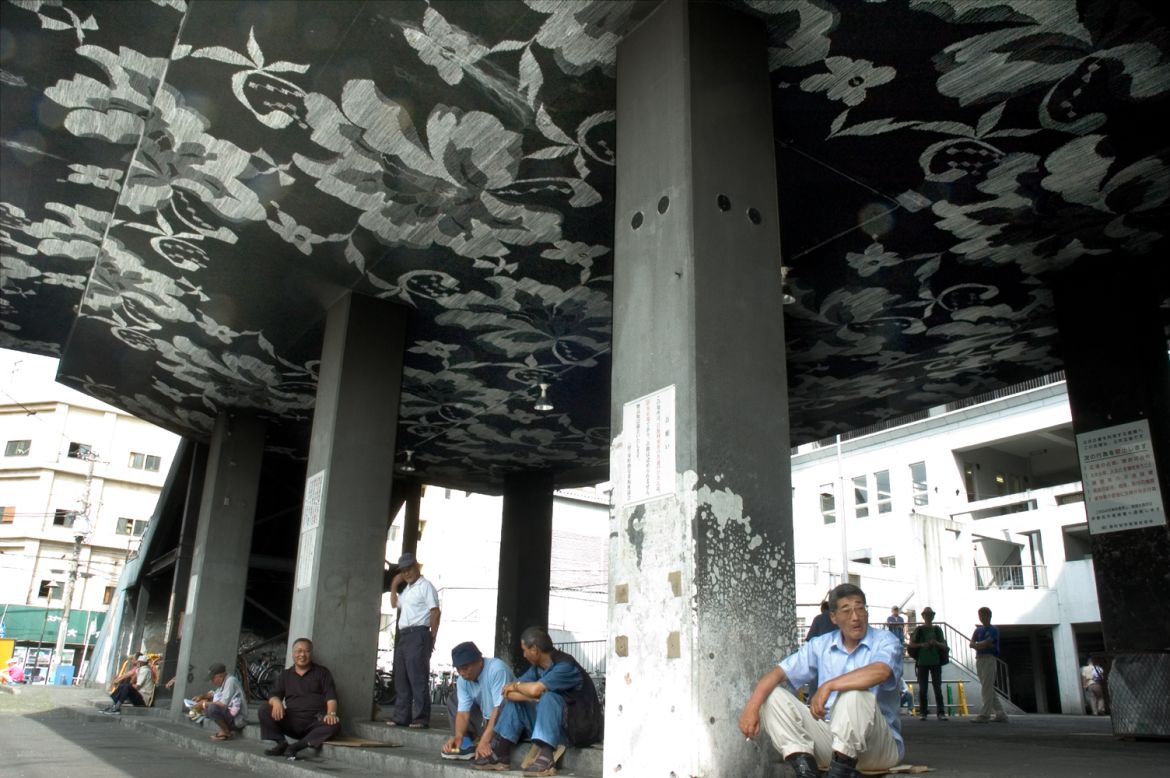 Enjoying the shade under a ceiling painted by Kitagawa. The artist is often commissioned to provide installations for cities, festivals and cultural events. 
