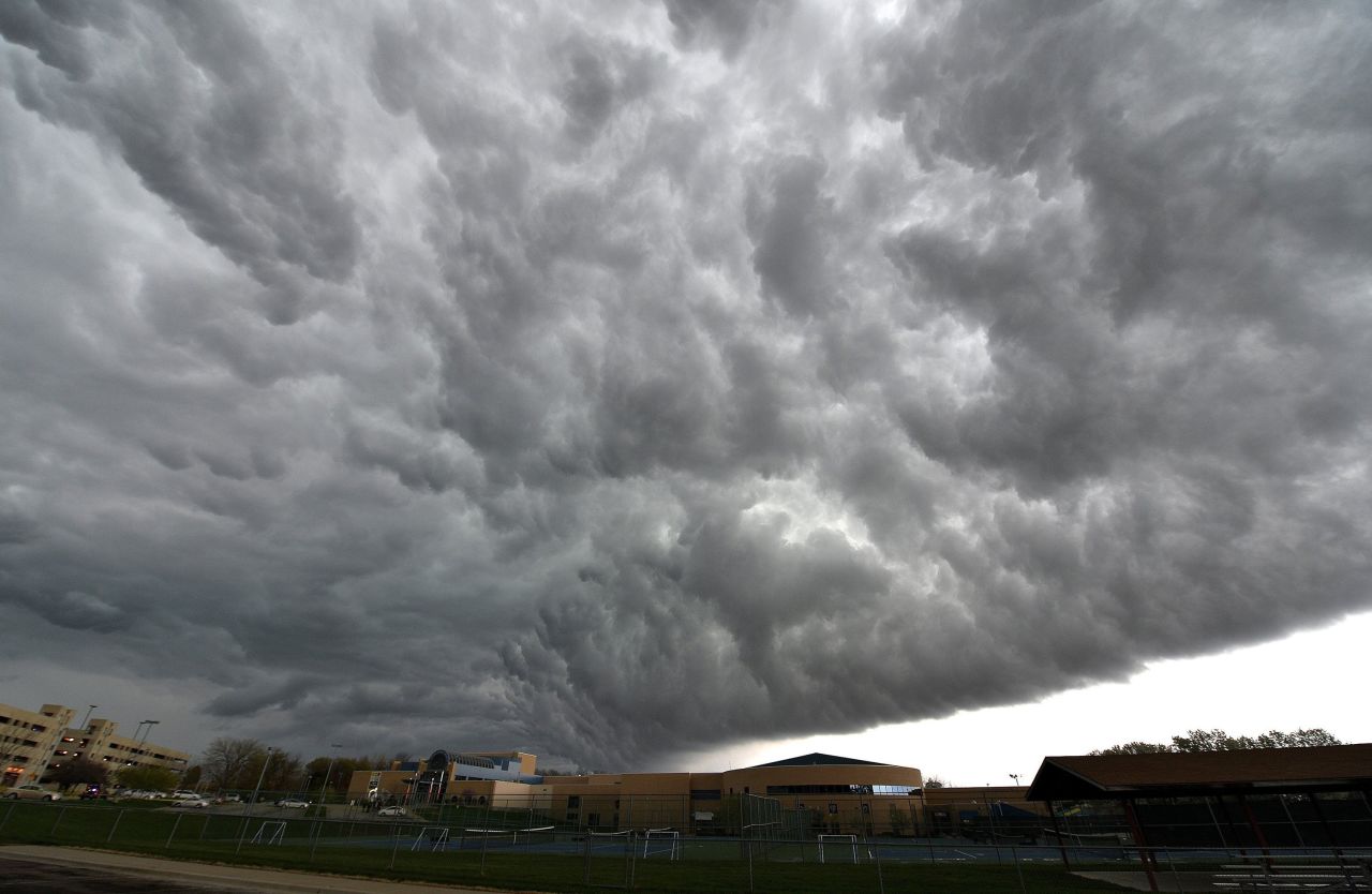 Storm clouds gather over the Jewish Community Center of Greater Kansas City on April 13. It was the site of the first shooting.