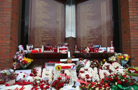 The names of the 96 victims are listed on a memorial outside Liverpool's Anfield stadium. 