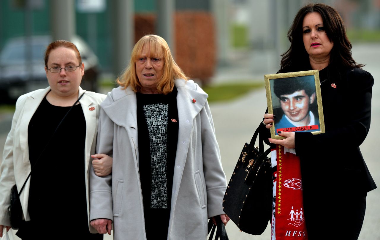 A new inquest into the tragedy started on March 31, 2014. Donna Miller (right), whose brother Paul Carlile died at Hillsborough, walks next to Mary Corrigan (center), whose son Keith McGrath was also killed, as they arrive to attend the opening day.