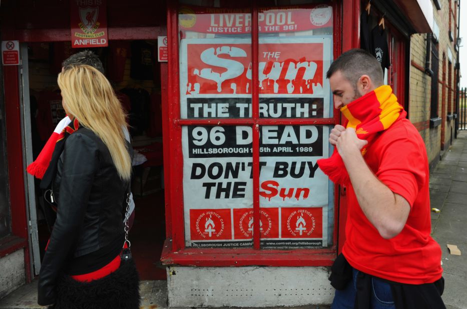 A poster protesting about the way in which Liverpool fans were blamed for the Hillsborough disaster is displayed outside Anfield in 2012. The club's supporters boycotted "The Sun" newspaper due to its coverage of the deaths.
