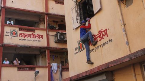 Gaurav Shrinivas Sharma, a climber nicknamed Indian Spiderman, campaigns in Mumbai, India, on Friday, April 11. Sharma is an independent candidate from the South Mumbai constituency. 