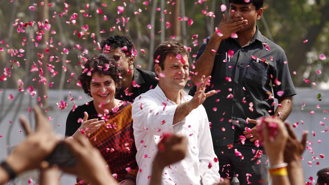 Rahul Gandhi, one of the leading candidates for prime minister, waves to supporters in Amethi, India, as he arrives to file his nomination on April 12.