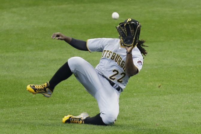 Pittsburgh outfielder Andrew McCutchen makes a diving catch Sunday, April 13, during a Major League Baseball game in Milwaukee. 