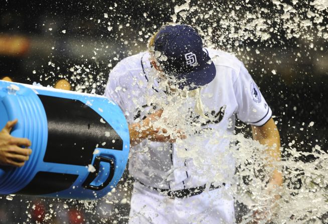 San Diego pitcher Andrew Cashner is dumped with Powerade after he threw a one-hitter Friday, April 11, in a home game versus Detroit. San Diego won 6-0.