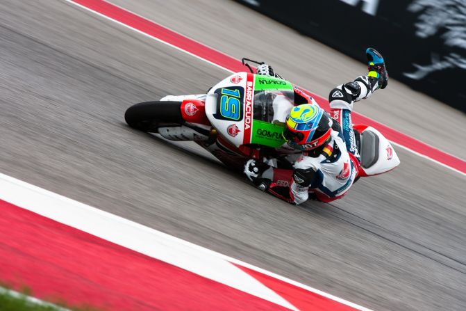 Xavier Simeon slides on his motorcycle during a turn at the Moto2 race in Austin, Texas, on Sunday, April 13. Simeon crashed and didn't finish the race, which was won by Maverick Vinales.