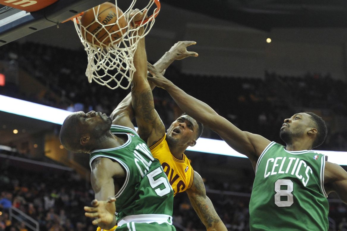 Cleveland forward Alonzo Gee dunks on Boston center Joel Anthony during an NBA basketball game Saturday, April 12, in Cleveland. The Celtics won the game 111-99.