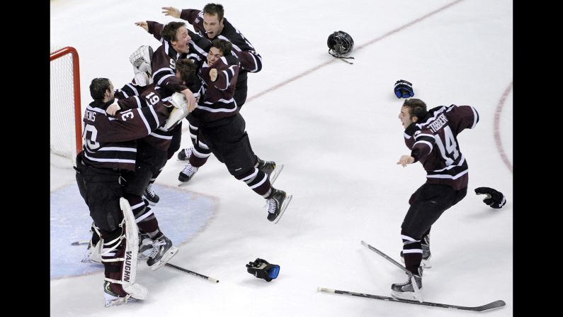 Members of the Union College men's hockey team celebrate after defeating Minnesota 7-4 and winning the NCAA championship on Saturday, April 12. It was the first-ever title for Union, a small private school in Schenectady, New York.