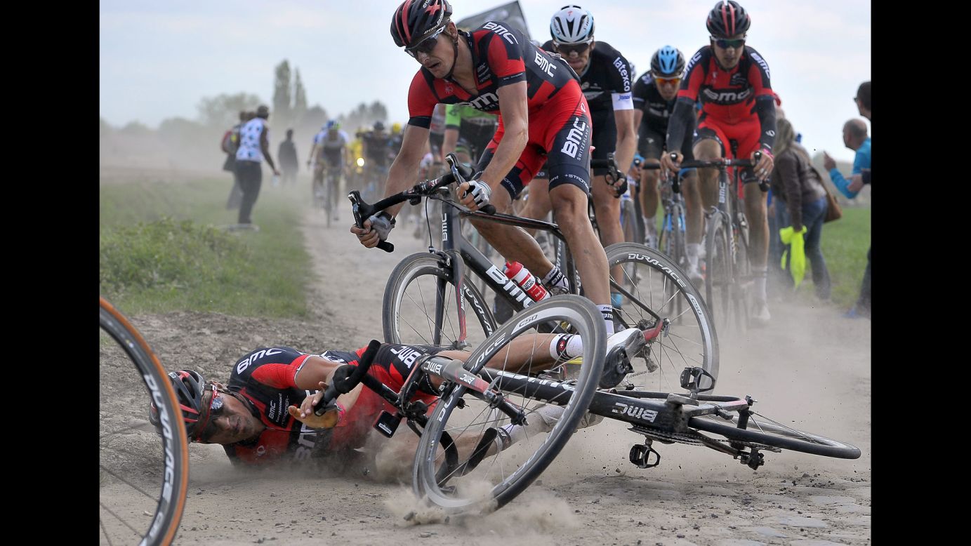 Greg Van Avermaet crashes Sunday, April 13, during the 112th Paris-Roubaix cycling race in Roubaix, France. Dutch cyclist Niki Terpstra won the one-day road race, which was first held in 1896. 