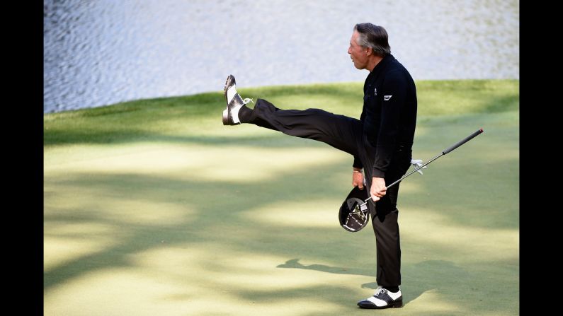Golf legend Gary Player salutes the gallery Wednesday, April 9, during the annual Par 3 Contest that is held prior to the Masters tournament in Augusta, Georgia. Ryan Moore won the Par 3 Contest but missed the cut during the actual tournament. No Par 3 winner has ever won the Masters in the same year.