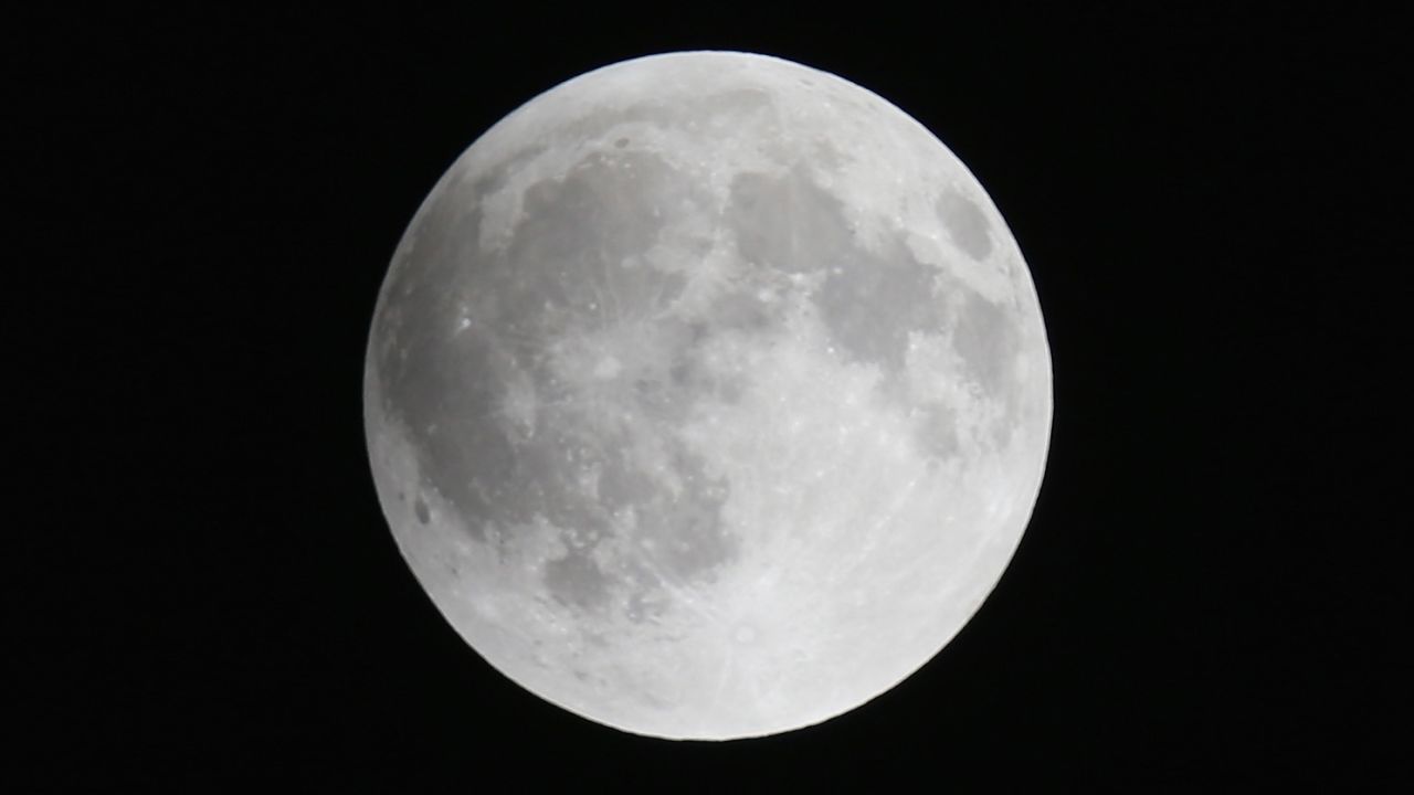 The moon is seen from Miami before the beginning of the total lunar eclipse. The blood moon was most prominent in North and South America.