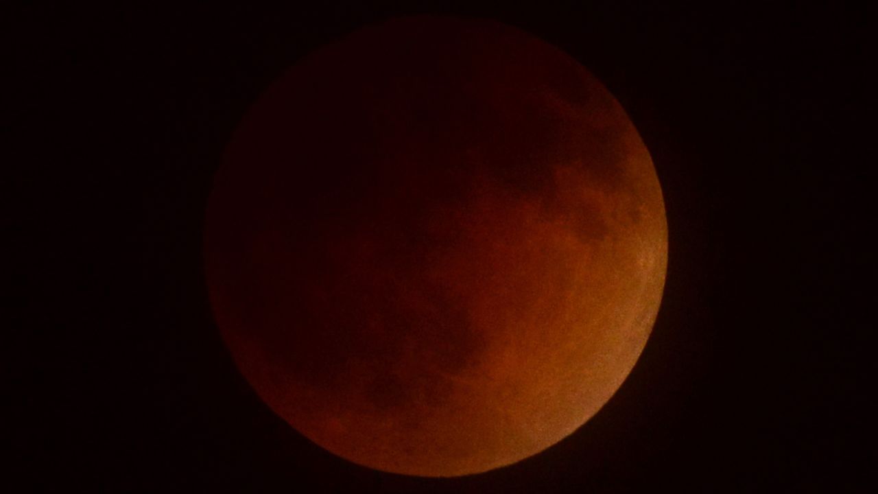 A lunar eclipse takes place over Southern California early Tuesday as seen from the San Gabriel Valley. North America will see a blood moon four times -- known as a tetrad -- between now and September 2015.