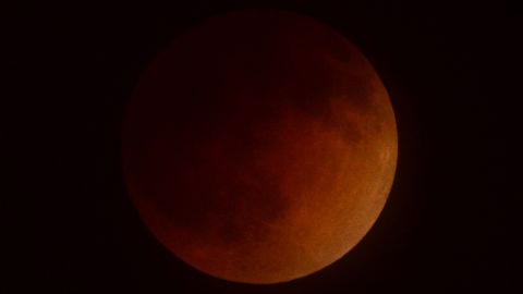 A lunar eclipse takes place over Southern California early Tuesday as seen from the San Gabriel Valley. North America will see a blood moon four times -- known as a tetrad -- between now and September 2015.