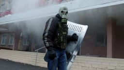 A pro-Russia protester takes part in the storming of regional police building in the eastern Ukrainian city of Horlivka (Gorlovka), near Donetsk, on April 14, 2014. A