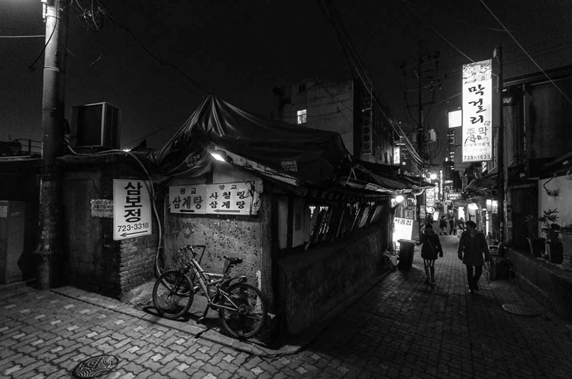 <strong>Insadong</strong><br /><br />There are approximately 100 galleries in Seoul's charming Insadong neighborhood, one of the most popular spots in the city for foreign visitors. <br /><br />While the main street has plenty to see, the alleyways, stuffed with eateries, tea houses and traditional drinking holes, are great for exploring at night, as captured here by <a href="http://rjkoehler.tumblr.com/" target="_blank" target="_blank">Robert Koehler</a>, one of the most prolific foreign travel writers/photographers in Korea. <br /><br /><a href="http://travel.cnn.com/seoul/life/24-seoul-adventures-24-hours-133312" target="_blank">MORE: Seoul: 24 hours, 24 adventures</a><br /><br />