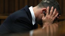 South African sprinter Oscar Pistorius reacts during his trial at the North Gauteng High Court in Pretoria on April 15, 2014.