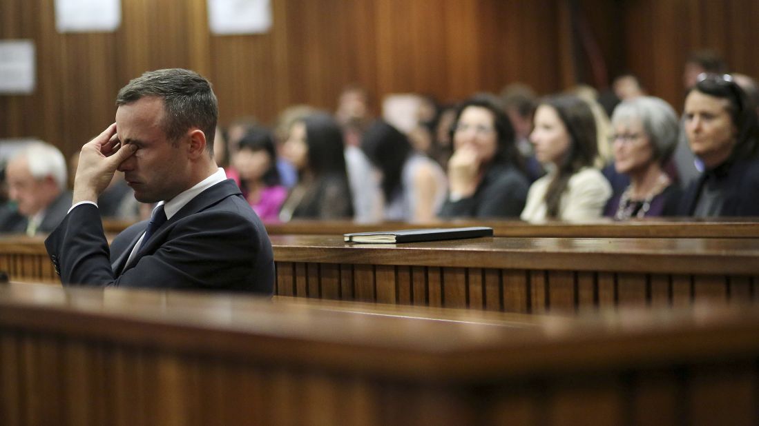Pistorius rubs his eye Tuesday, April 15, after testifying during his murder trial.