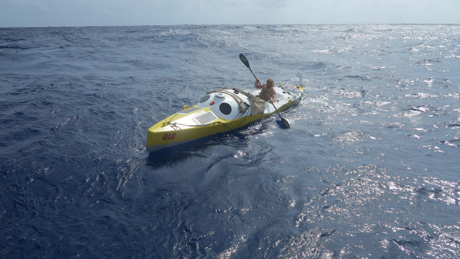 Olek Doba steers his kayak, "Olo," in the Atlantic Ocean on March 25.