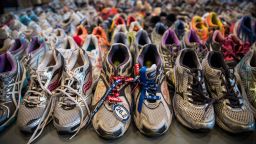 BOSTON, MA - APRIL 14:  Runner's shoes are laid out in a display titled, "Dear Boston: Messages from the Marathon Memorial" in the Boston Public Library to commemorate the 2013 Boston Maraton bombings, on April 14, 2014 in Boston, Massachusetts. Last year, two pressure cooker bombs killed three and injured an estimated 264 others during the Boston marathon, on April 15, 2013.  (Photo by Andrew Burton/Getty Images)