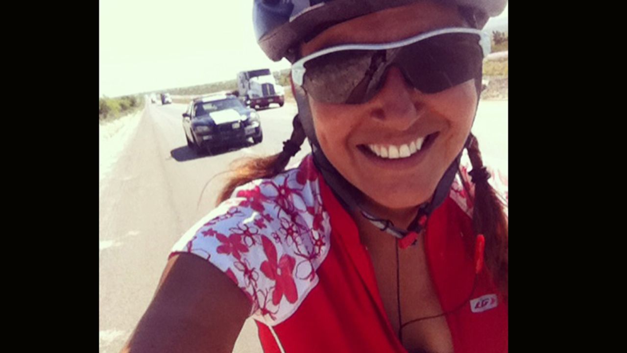 Mexico's federal police escorted Bastidas as she biked an average of 130 miles a day through the country. 