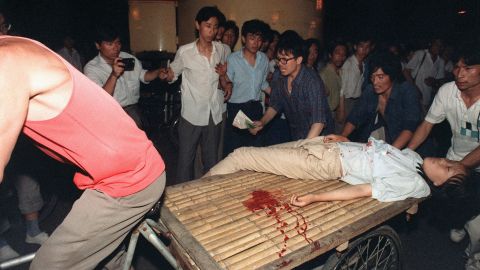  A girl wounded during the clash between the army and students on June 4, 1989.