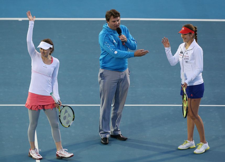 As a child Bencic idolized Swiss tennis stars Roger Federer, Stanislas Wawrinka, and Martina Hingis (left), and still has posters of them on her wall. 