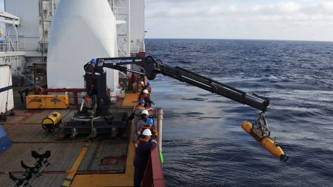 Operators aboard the Australian ship Ocean Shield move Bluefin-21, the U.S. Navy's autonomous underwater vehicle, into position to search for the jet on April 14, 2014.