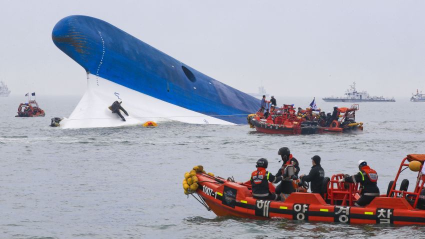 South Korean Coast Guard members search for survivors on April 16.