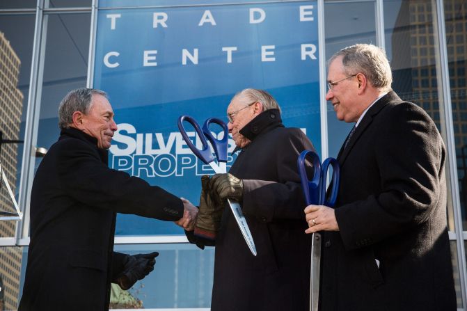 Bloomberg shakes hands with Larry Silverstein, the developer who held the lease to the World Trade Center buildings in 2001, after cutting the ribbon at the opening ceremony of Four World Trade Center. It's the first tower to open at the original site of the World Trade Center.