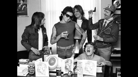 The band hangs out with their manager Michael Browning, right, in 1976.