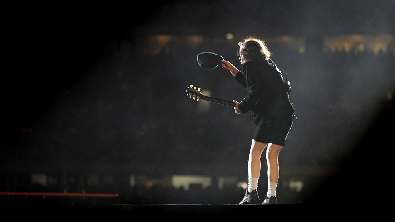 Angus Young performs with the band onstage in Melbourne in 2010.