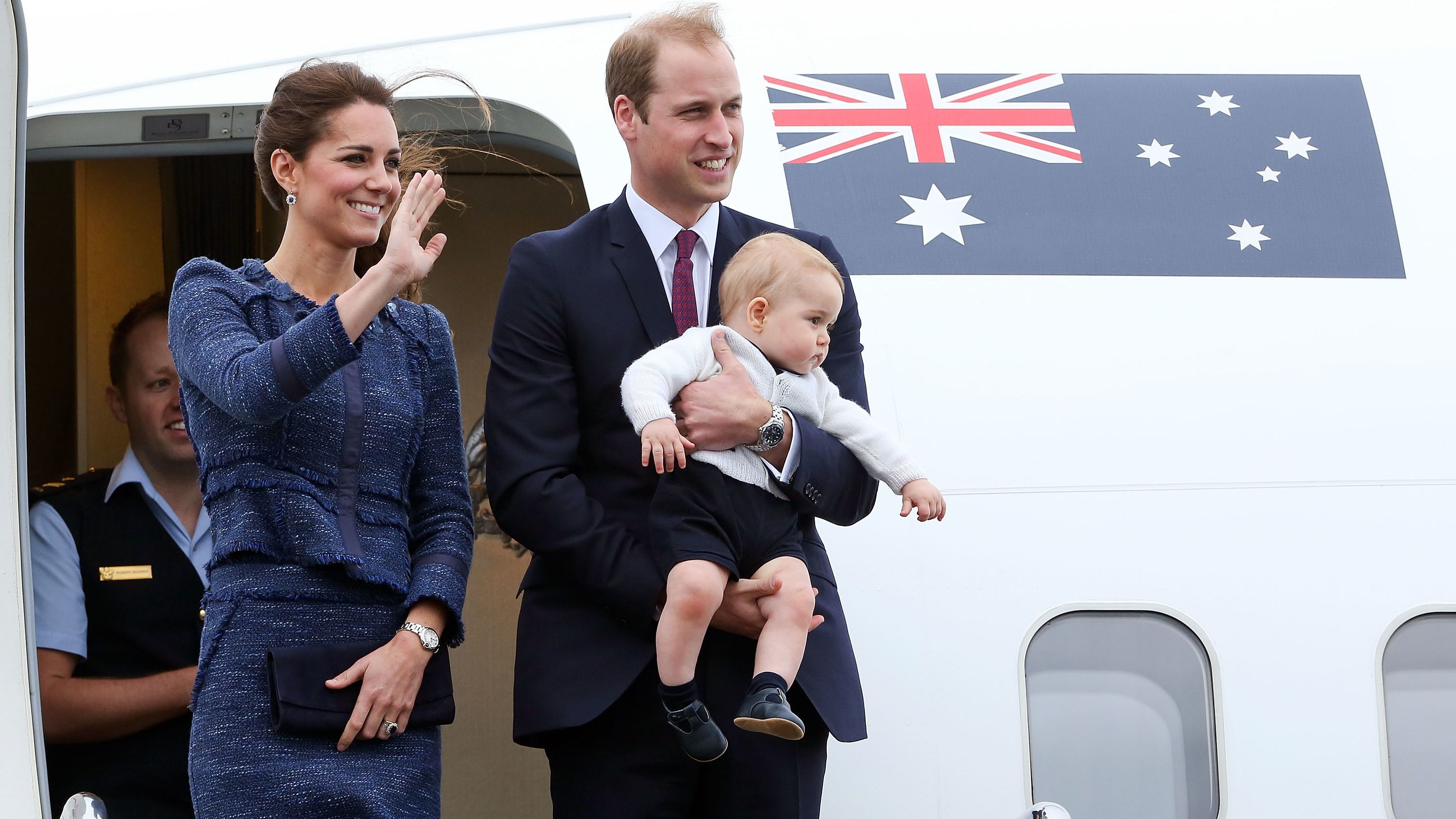 The royal family waves to a crowd before boarding a plane in Wellington, New Zealand, in April 2014. They went on a three-week tour of Australia and New Zealand.